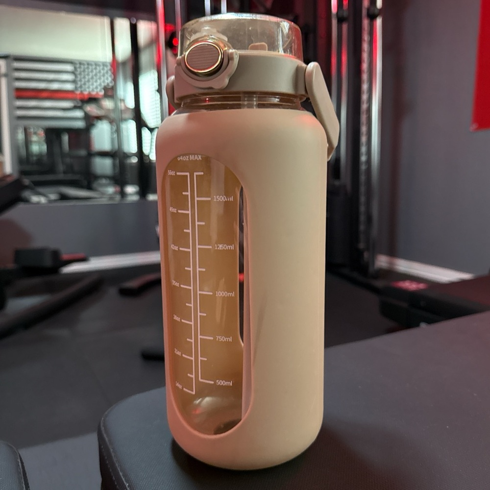 Beige Water Bottle with Measurement Markings